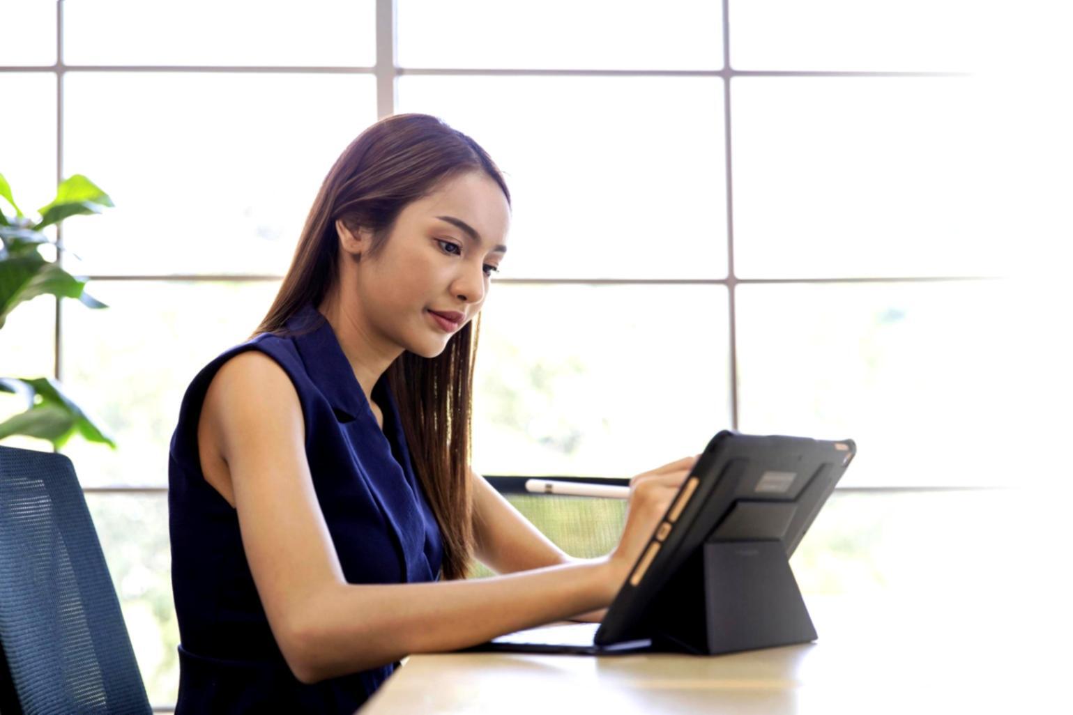 Financial analysis workspace with documents and data